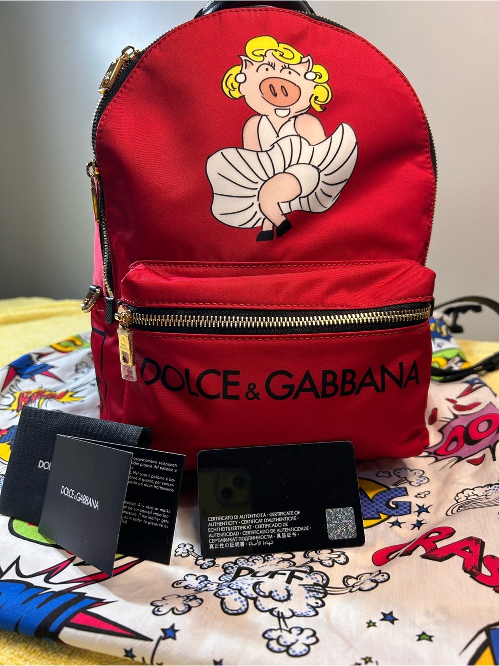 Authentic Dolce & Gabbana Red Logo Backpack with Cartoon Graphic